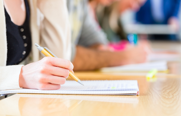 Student taking notes